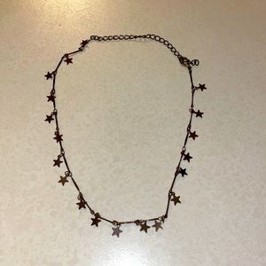 This is a star necklace in a bronze color!